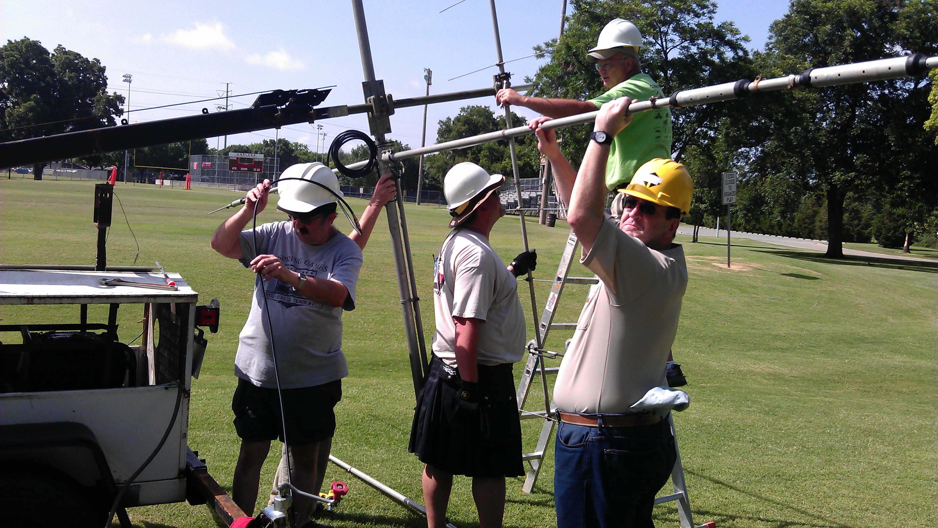 Wayne, Eric, Bill, and William getting the primary antenna ready